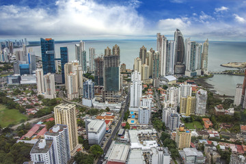 Fototapeta na wymiar The beautiful and modern skyline of tall city buildings of Downtown Panama under a blue sky