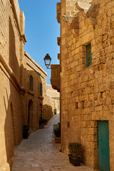 Old narrow street in Citadel. Victoria. Gozo.  Mata
