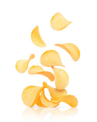 Potato chips fall on a heap with chips isolated on a white background