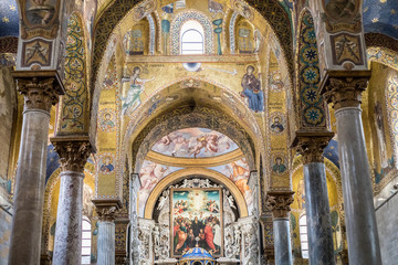 Fototapeta na wymiar PALERMO, SICILY, ITALY. Gold mosaics at Church of Santa Maria dell'Ammiraglio, also orthodox Church of the Martorana. Ceilings with golden mosaics and frescos of Saints and Angels. DEC 2017. 
