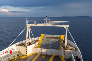Fototapeta na wymiar Front passenger ferry at sea in sunlight. Greece