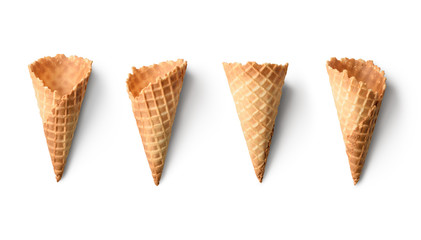 Collection of empty ice cream cones isolated on white background