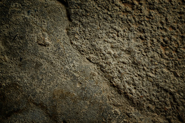 Closeup of dark grunge cement floor for background.