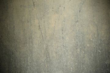 Closeup of dark grunge cement wall, for background.