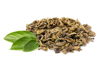 Fototapeta na wymiar Pile of green tea with fresh leaves isolated.