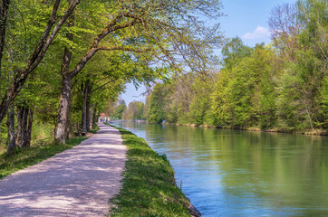 Munich riverside city park.
Spring time in Munich, Germany. Walkway beside Isar river in a sunny...