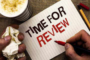 Writing note showing  Time For Review. Business photo showcasing Evaluation Feedback Moment Performance Rate Assess written by Man Holding Marker on Notebook Book on the jute background