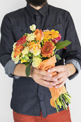 Hipster man with elegant bouquet