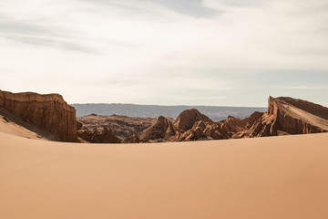 rock formation in the dunes of the moon valley in the atacama desert