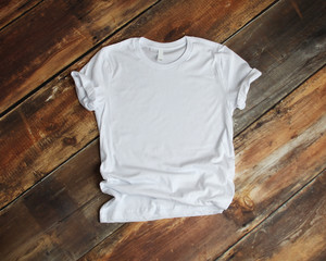 White T Shirt mockup flat lay on wood - obrazy, fototapety, plakaty