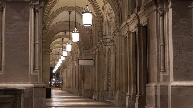 Timelapse of an archway at Rathaus at night