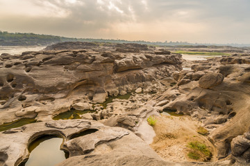 Three thousand waving the rocks beneath the Mekong river. Natural sandstone group Eroded through...