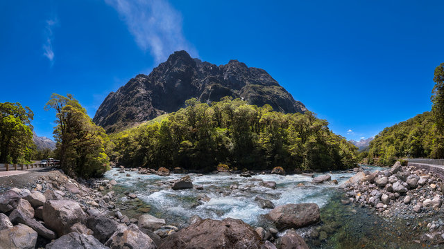 Panoramic View of Cleddan River next to Falls Creek Waterfall in Fiordland National Park on the way to Milford Sound in New Zealand, South Island.