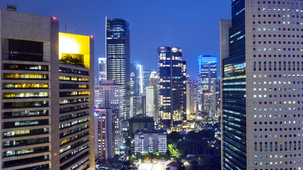 Aerial shot of skyscrapers at night in Jakarta