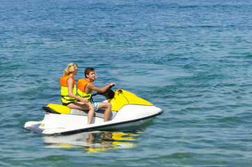 Couple on waverunner jetski ride