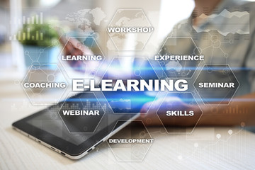 E-Learning on the virtual screen. Internet education concept.