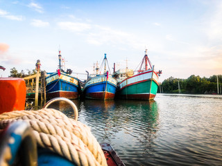 Fototapeta na wymiar wooden fishing boat at Thailand estuary