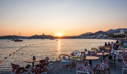 Fototapeta na wymiar People enjoy at beach cafe in Bodrum,Turkey