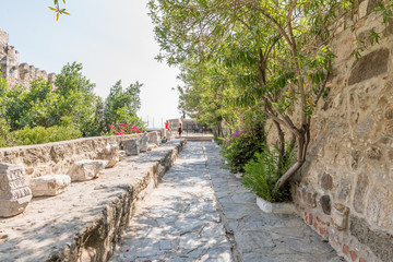 Unidentified people walk and explore in Bodrum Castle