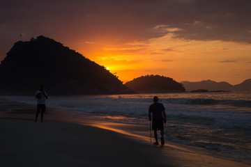 Fototapeta na wymiar amazing landscape of sunrise on Copacabana beach city of rio de janeiro real colors