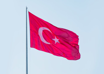 Turkish flag waving in blue sky, Istanbul, Turkey