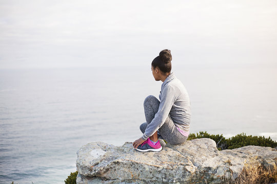 Woman, view and wellness for mental health, peace and fitness or midfulness.