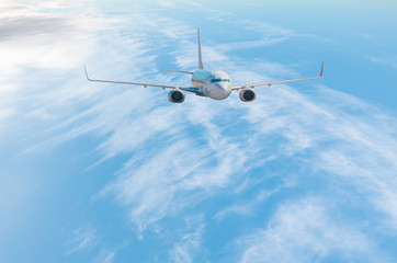 White passenger airplane in the clouds. travel by air transport