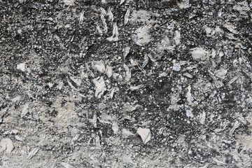 Close-up rough grungy cracked stone texture background. 