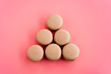 Macarons isolated on pink background