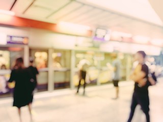 blurred image of business people, passenger or city people lifestyle inside the train subway station, transport in rush hour walk at subway station abstract blur, transportation concept.