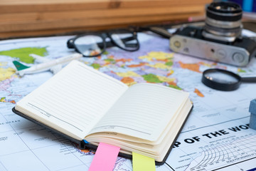 travel concept styles with map book grasses tag and camera