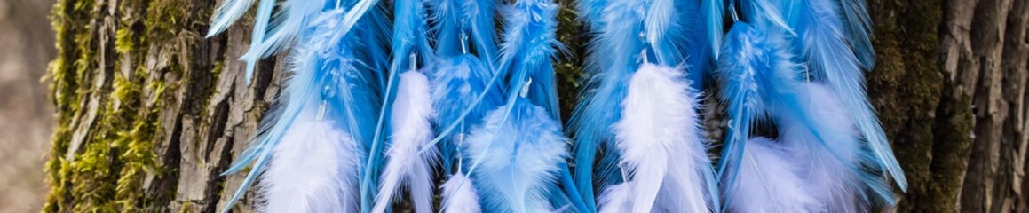 Banner of Handmade dream catcher with feathers threads and beads rope hanging