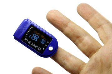 A pulse oximeter used to measure pulse rate and oxygen levels for a patient