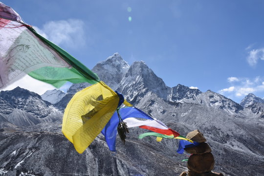 Praying flag in front of Ama Dablam, Nepal