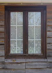 brown colored old wooden house window