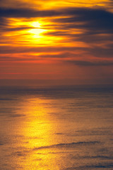 Sunset or sunrise over sea surface