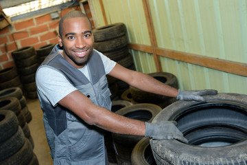 Fototapeta na wymiar worker with tires