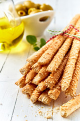 Crunchy dried grissini breadsticks with olive oil