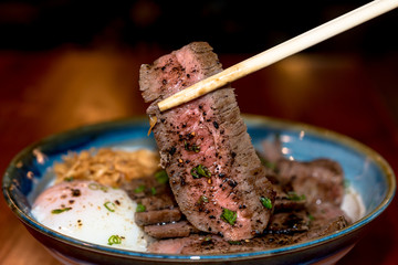 Beef Steak Donburi with egg and fried garlic