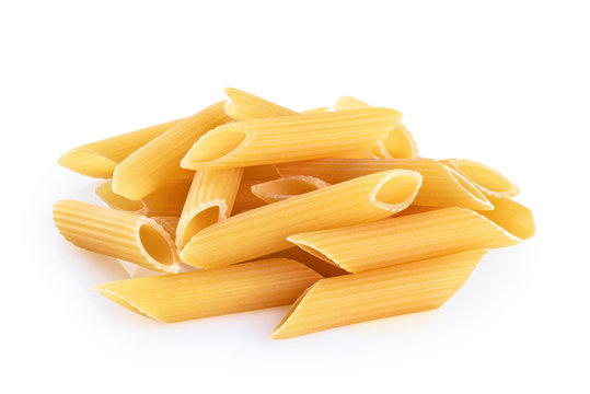 Penne rigate pasta isolated on white background. Raw.