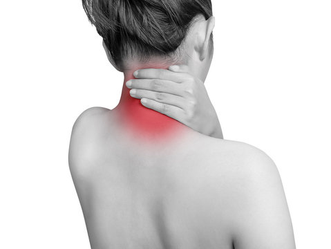 woman suffering from neck pain using hand massage painful neck and nape. mono tone color with red highlight at neck , neck muscles isolated on white background. health care ,medical concept. studio