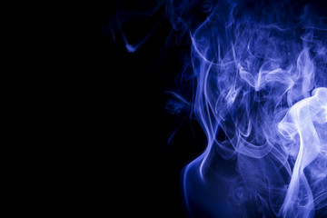 Blue smoke on black background