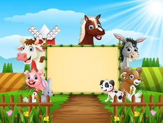 Obraz na płótnie Canvas Farm animals with a blank sign bamboo