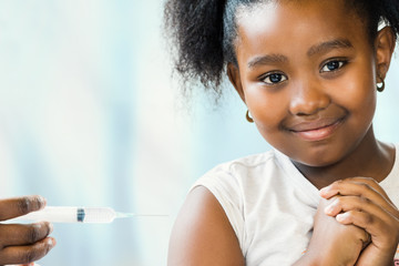 Brave little african girl at doctor's practice.