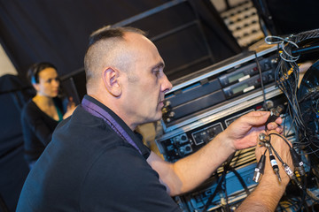 Soundman connecting up equipment