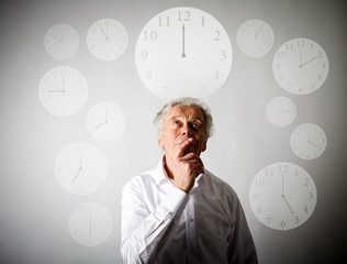 Old man in white and all day. Time is passing.