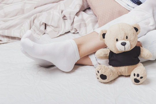 Teddy bear on the bed, soft focus background