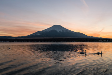 View of Mount Fuji and Lake Yamanakako in winter evening. Lake Yamanakako is the largest of the Fuji Five Lakes.