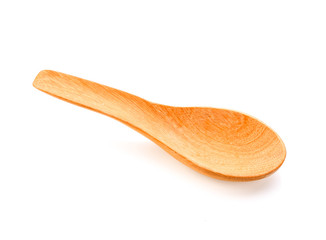 Wooden spoon on white background