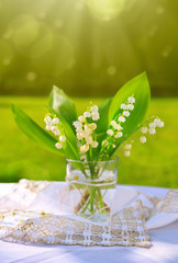 Lily of the valley bouquet in glas vase.